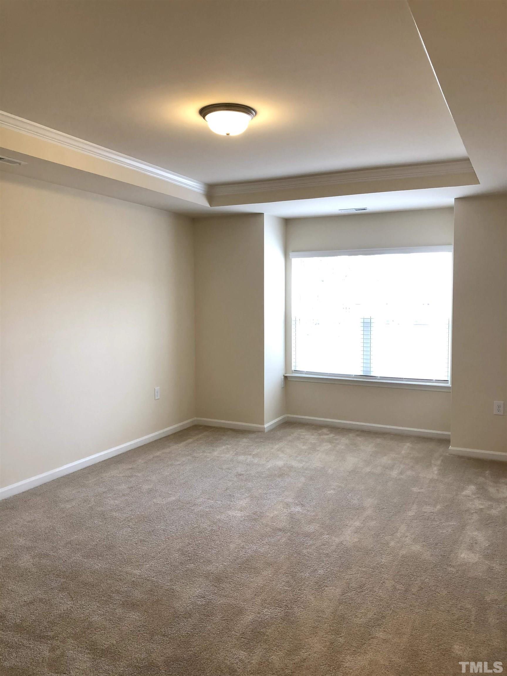 1215 Merrion Avenue Durham, NC 27703 - Photo 11 of 19 an empty room with a window