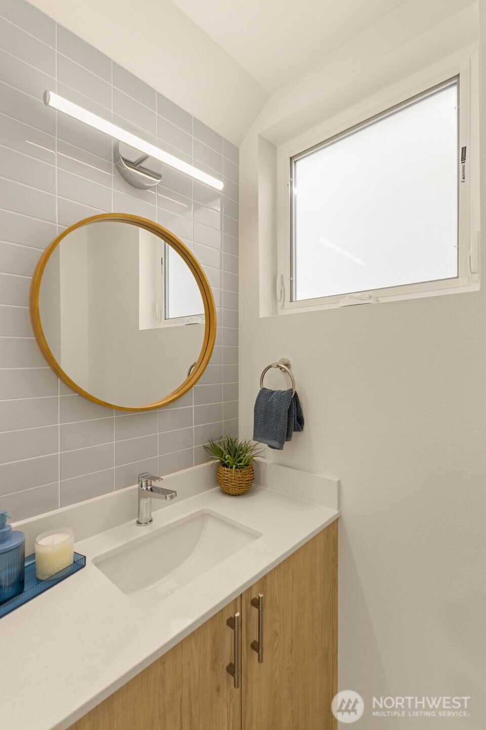 3916 South Juneau Street Seattle, WA 98118 - Photo 24 of 40 a bathroom with a sink and a mirror