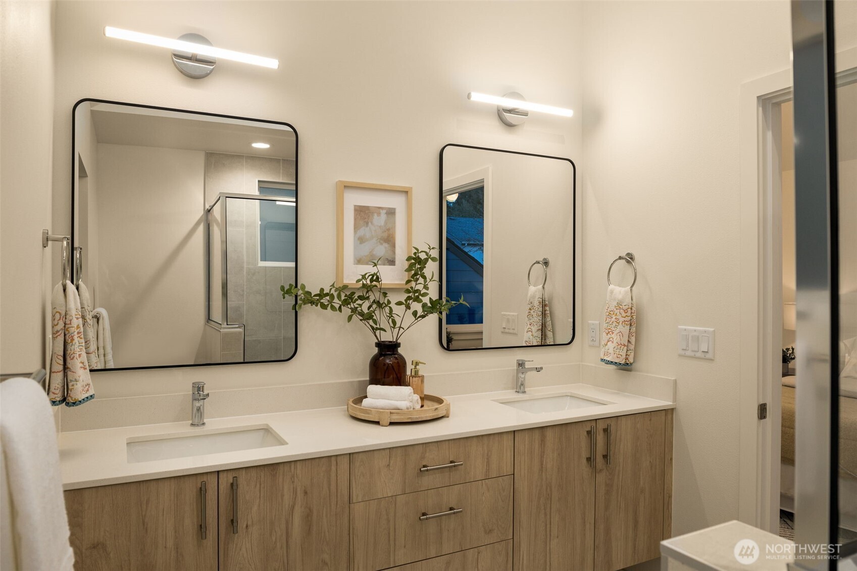 3916 South Juneau Street Seattle, WA 98118 - Photo 31 of 40 a bathroom with a double vanity sink and a mirror
