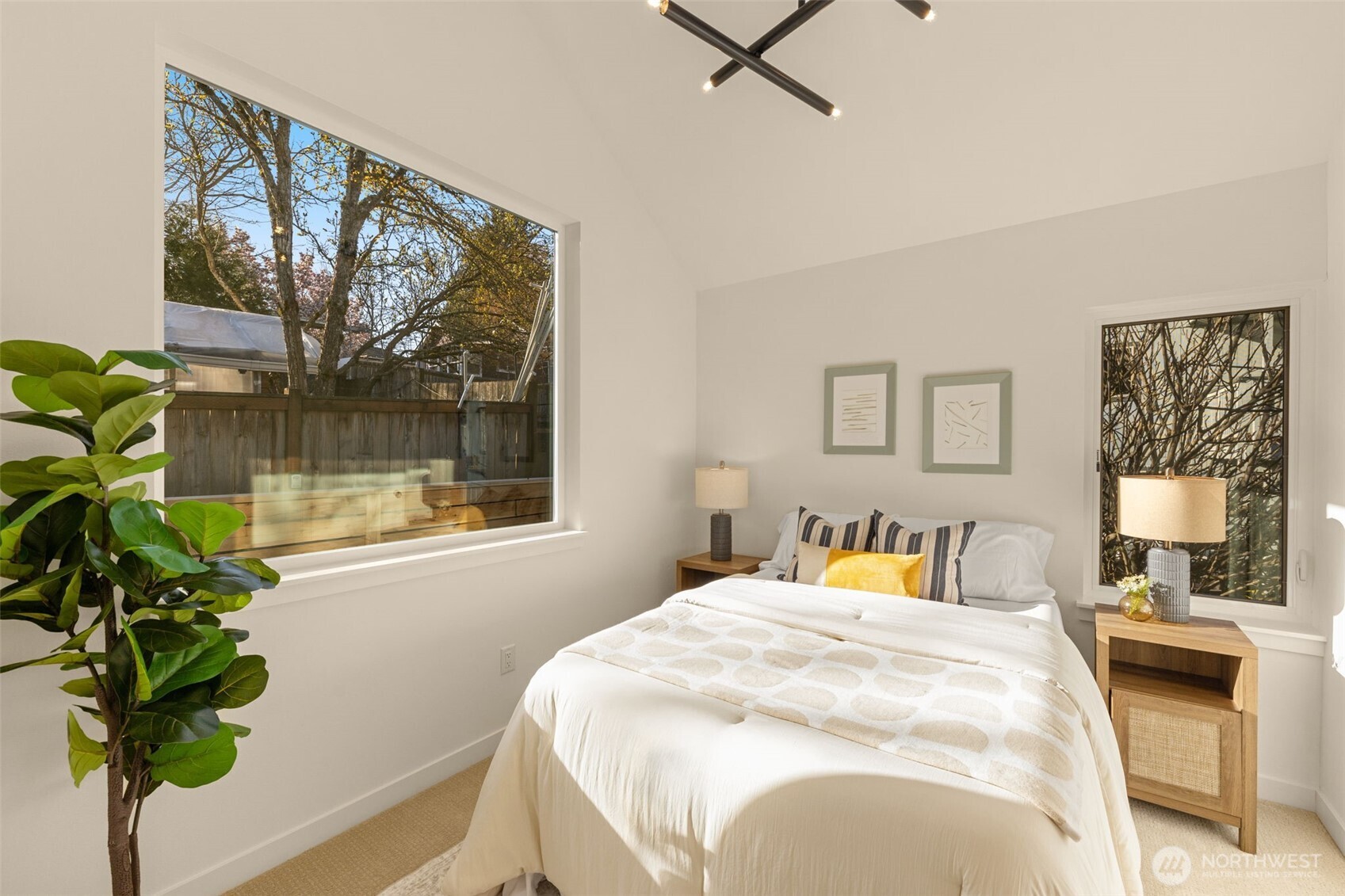 3916 South Juneau Street Seattle, WA 98118 - Photo 32 of 40 a bedroom with a bed and a window