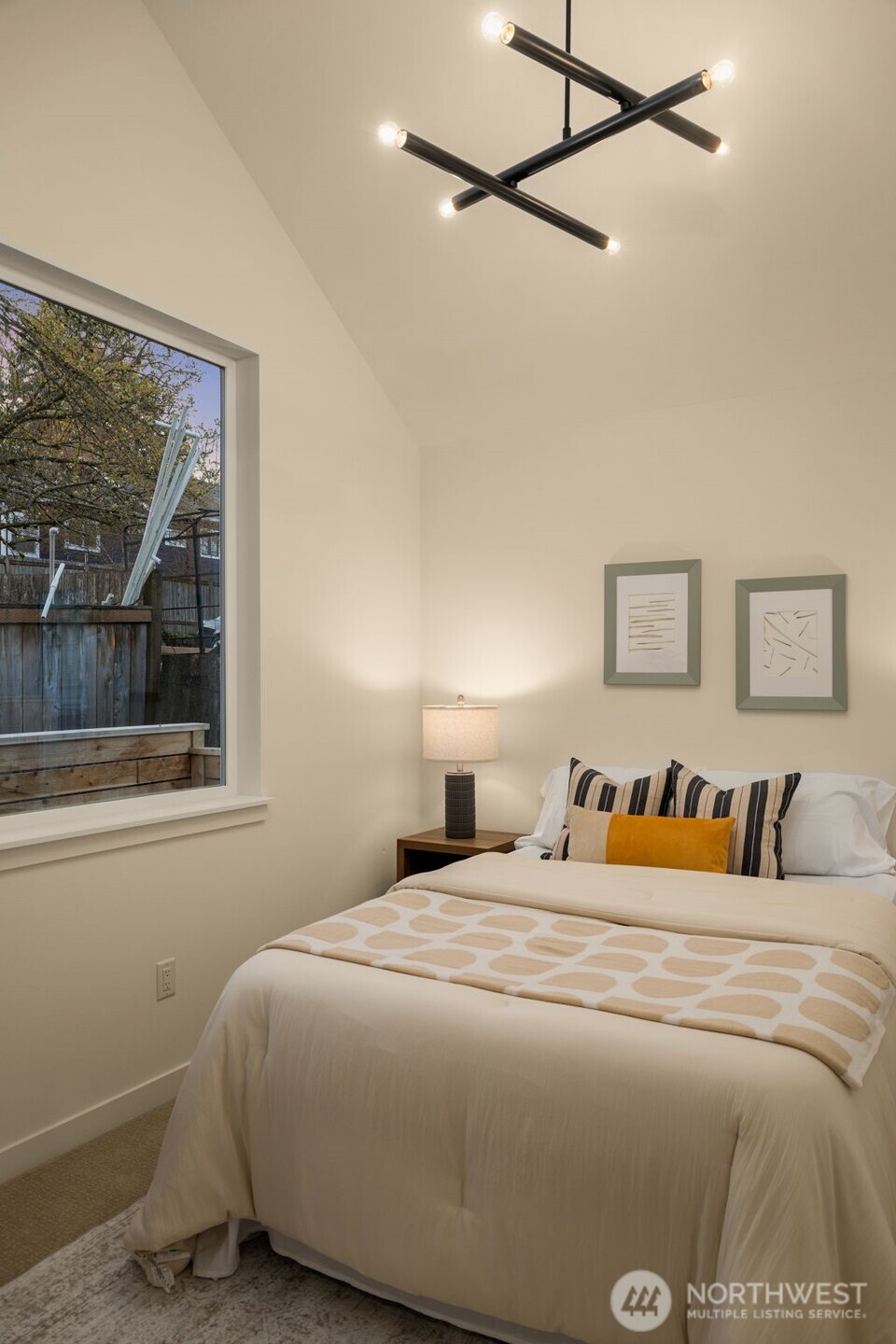 3916 South Juneau Street Seattle, WA 98118 - Photo 33 of 40 a bedroom with a bed and window