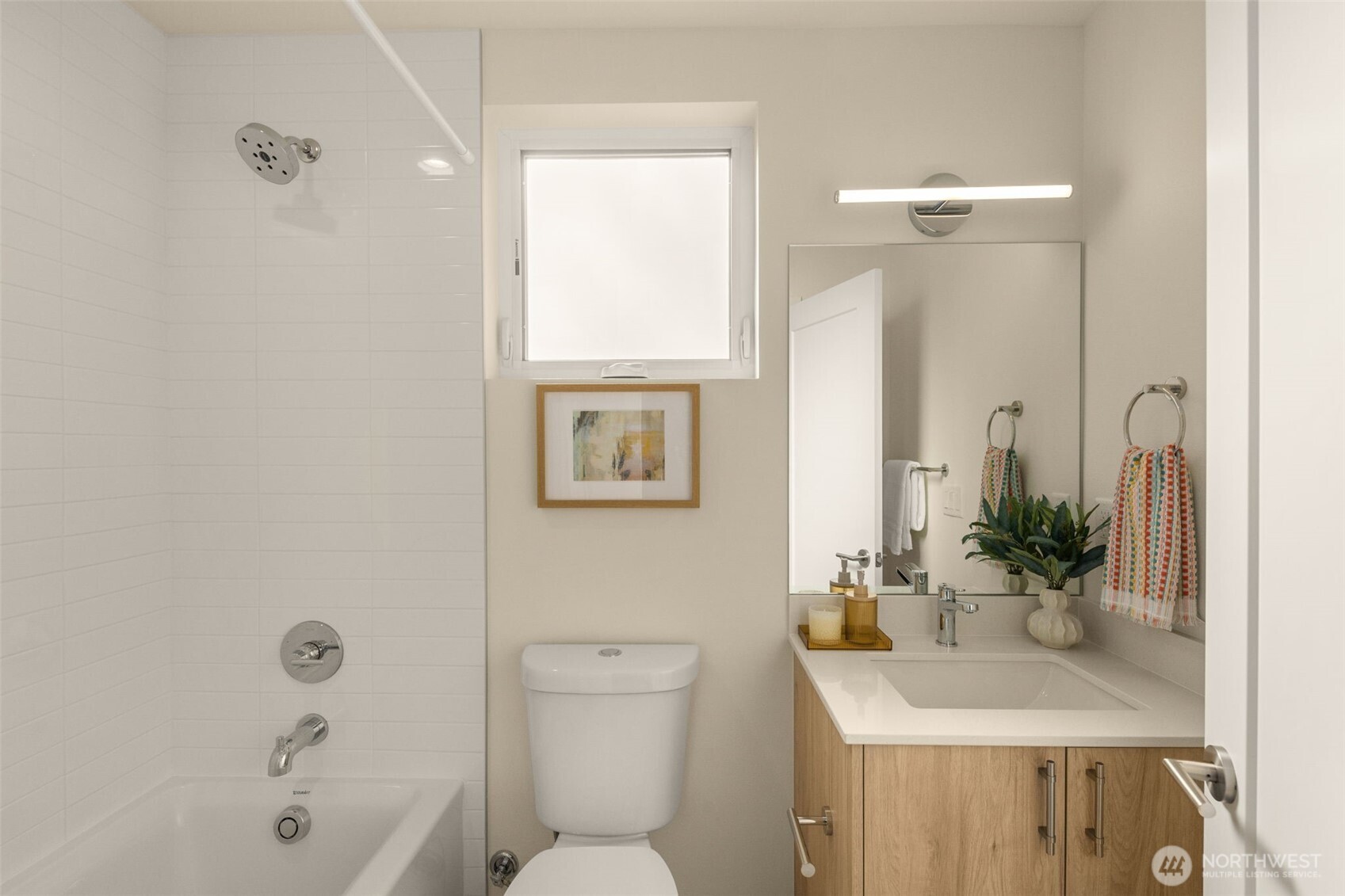 3916 South Juneau Street Seattle, WA 98118 - Photo 34 of 40 a bathroom with a sink a toilet and shower