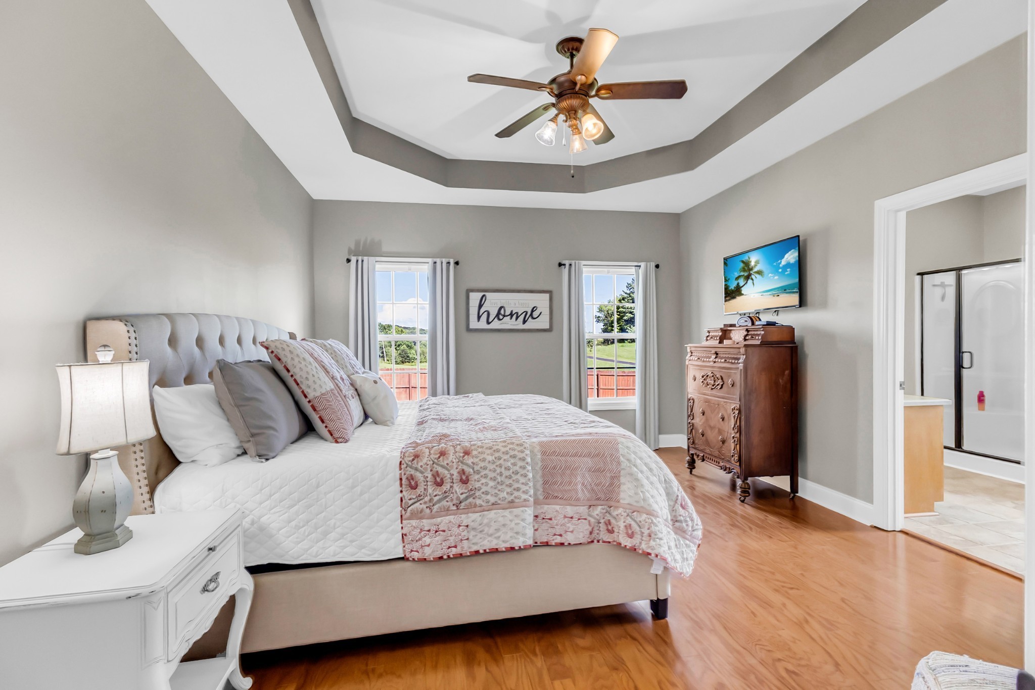 226 Ranch Road Portland, TN 37148 - Photo 23 of 54 a bedroom with a bed and a chandelier