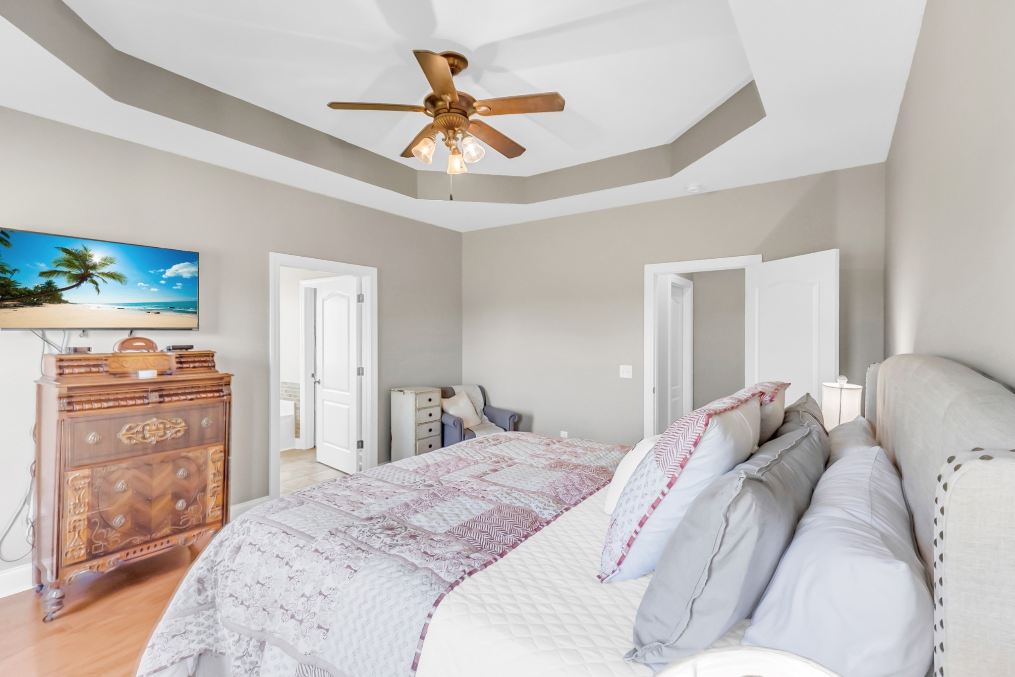 226 Ranch Road Portland, TN 37148 - Photo 26 of 54 a bedroom with a bed and a chandelier