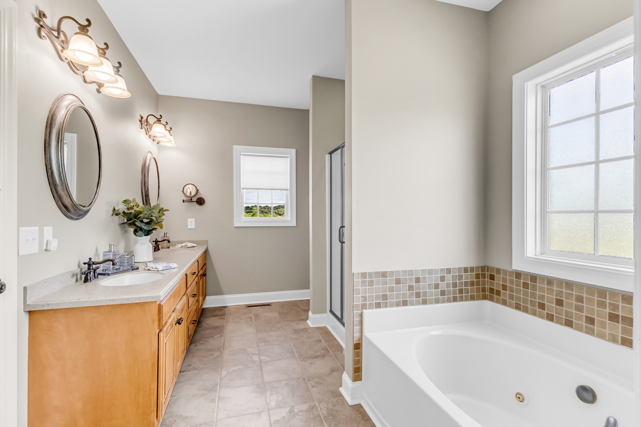 226 Ranch Road Portland, TN 37148 - Photo 27 of 54 a bathroom with a tub sink and mirror