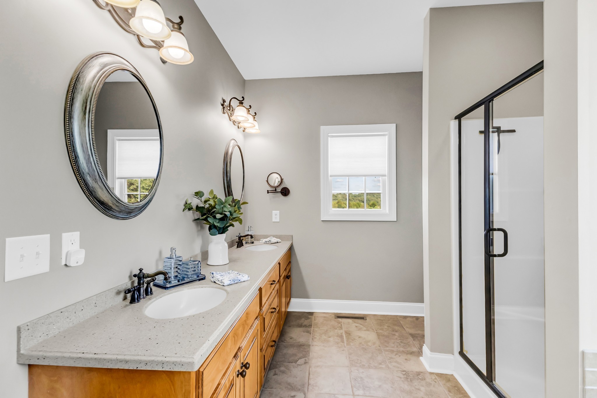 226 Ranch Road Portland, TN 37148 - Photo 28 of 54 a bathroom with a sink a mirror and a shower