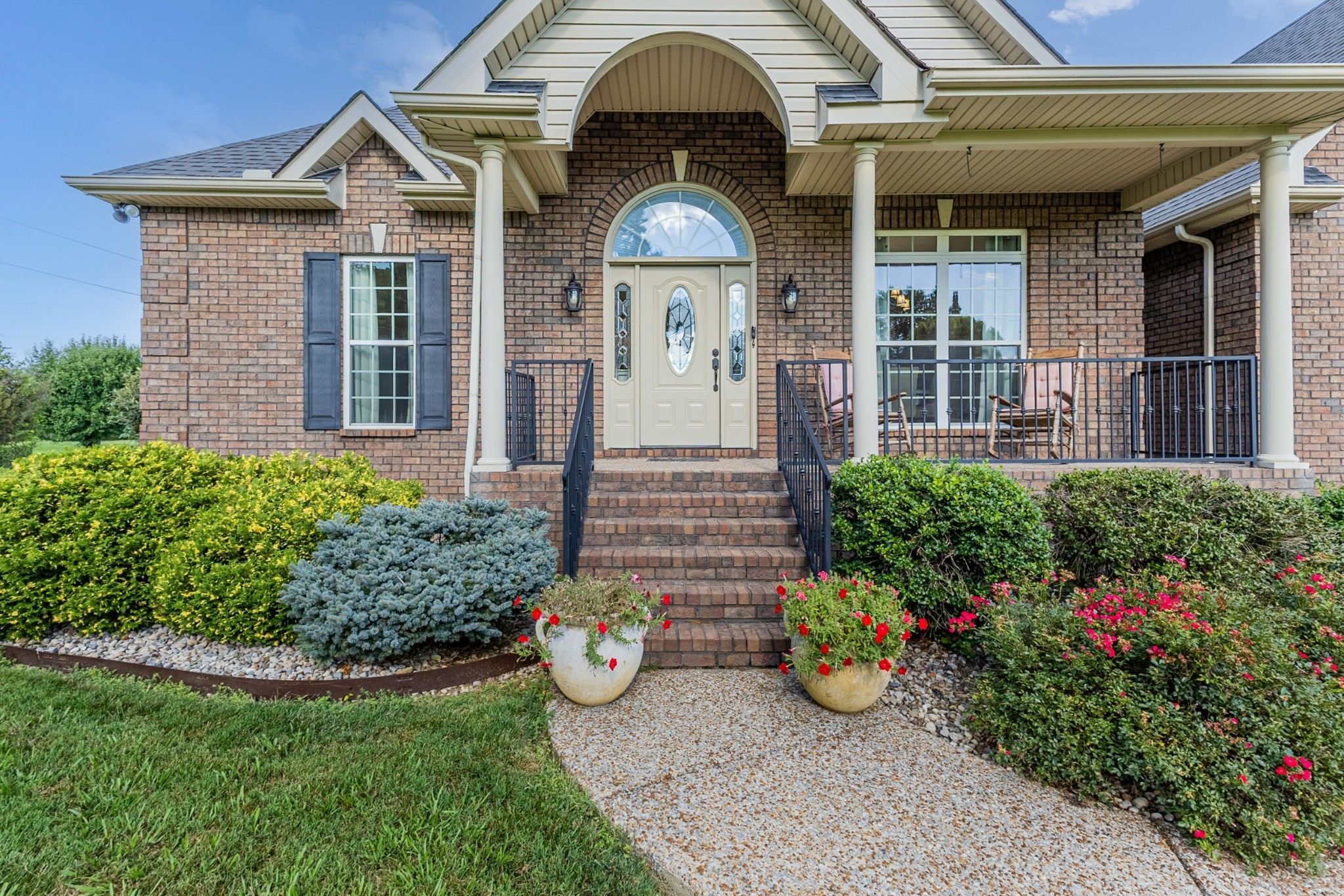 226 Ranch Road Portland, TN 37148 - Photo 3 of 54 a front view of a house with a garden