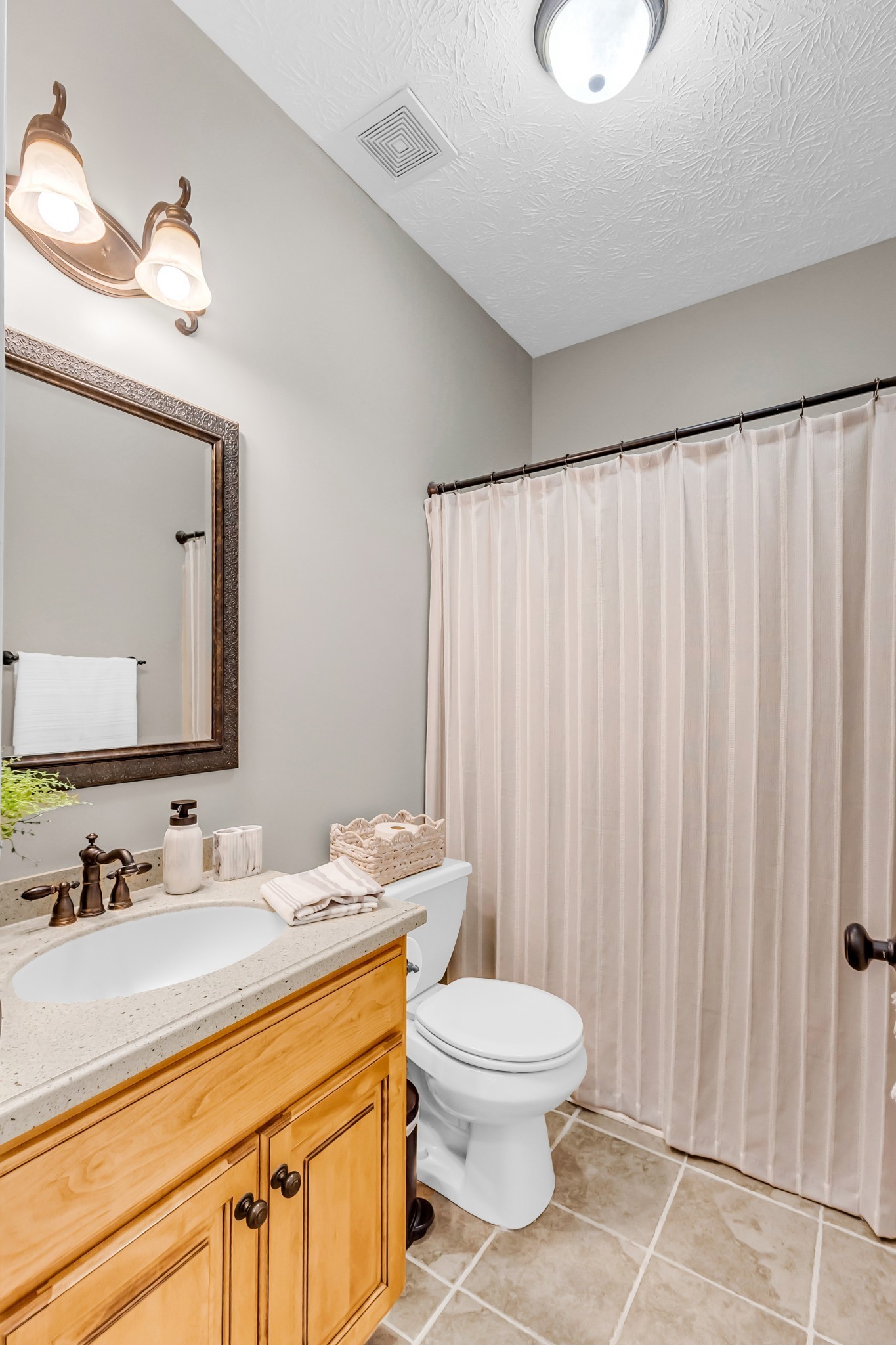 226 Ranch Road Portland, TN 37148 - Photo 37 of 54 a bathroom with a toilet sink and mirror