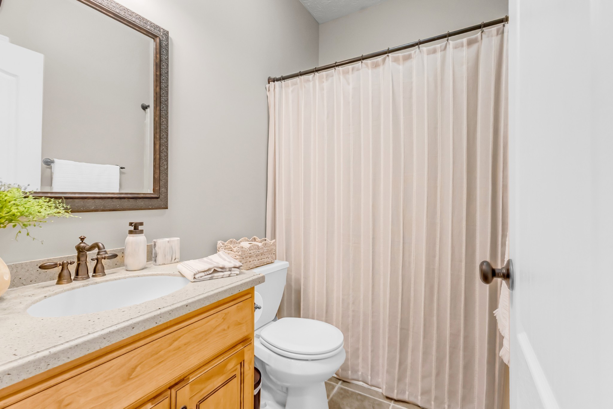 226 Ranch Road Portland, TN 37148 - Photo 38 of 54 a bathroom with a sink a toilet and a mirror