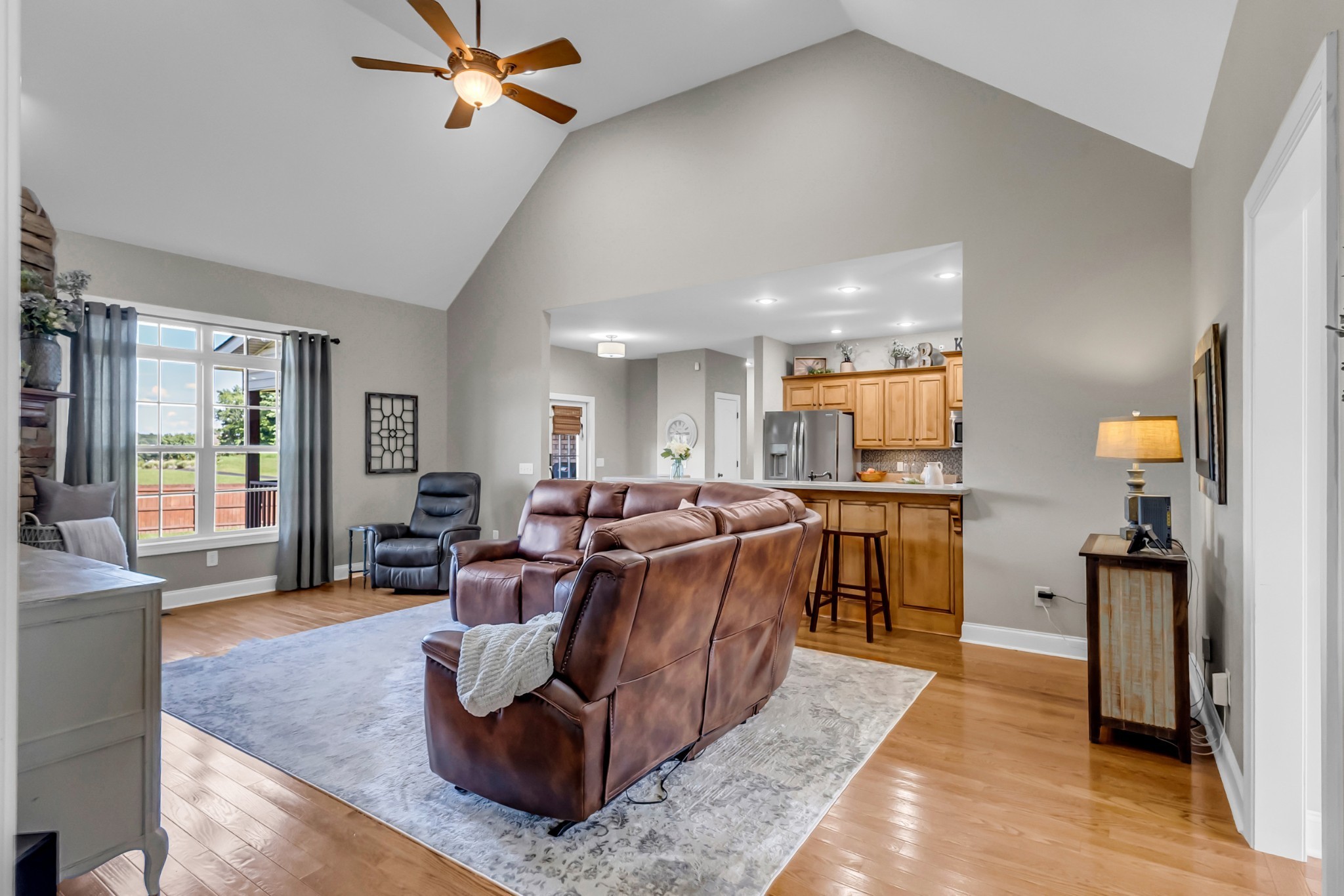226 Ranch Road Portland, TN 37148 - Photo 9 of 54 a living room with furniture kitchen view and a large window