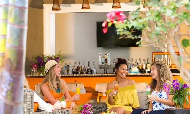 a bathroom with a sink mirror and vanity