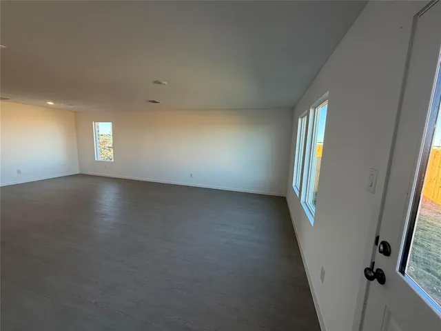 wooden floor and windows in a room