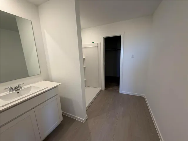 a bathroom with a sink and toilet