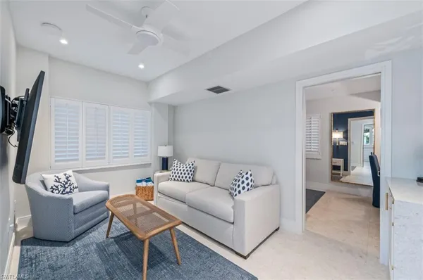 a spacious bedroom with a bed and walk in closet