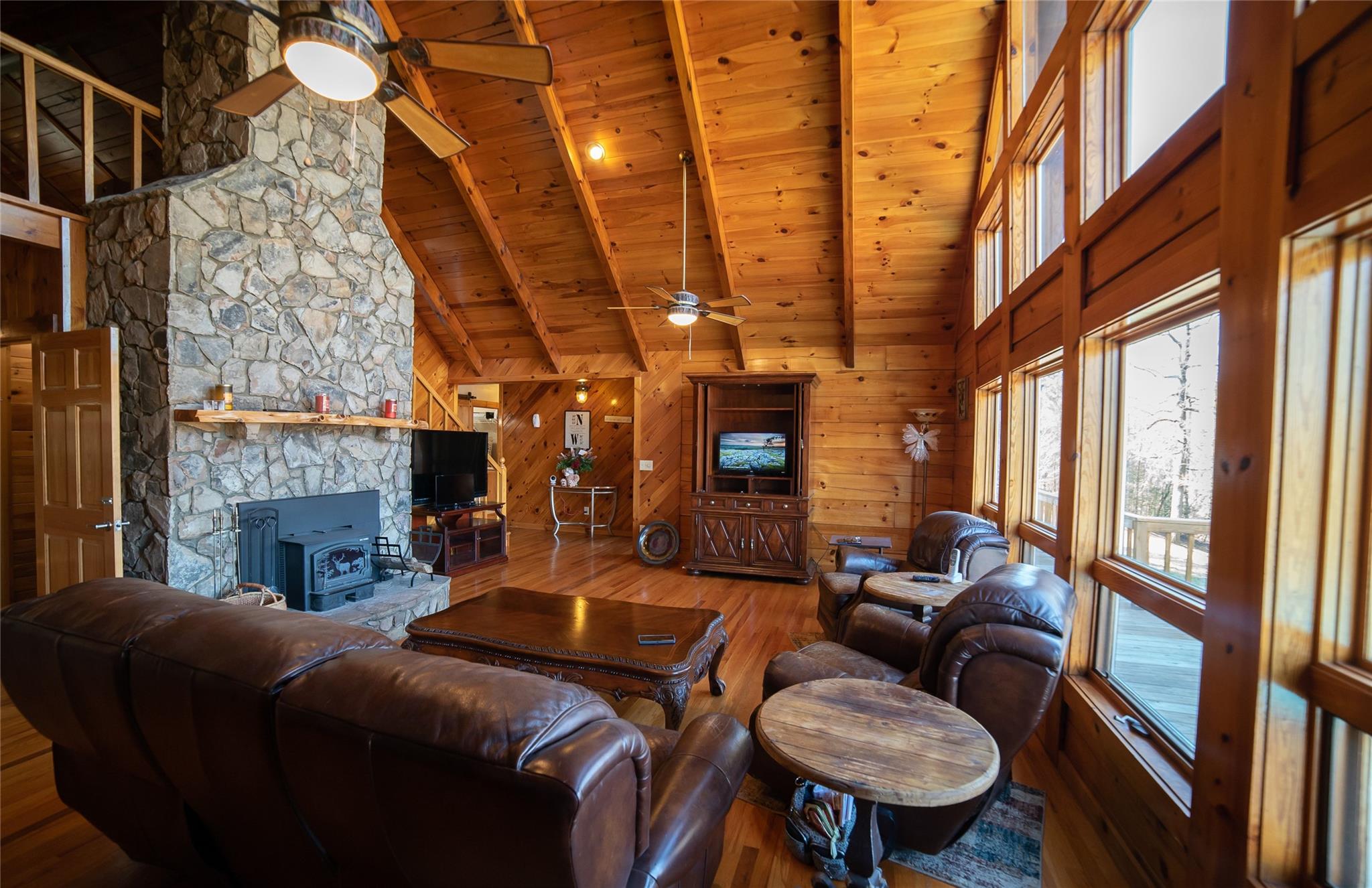 2525 Winkler Way Road Lenoir, NC 28645 - Photo 12 of 47 a living room with furniture a fireplace and a large window