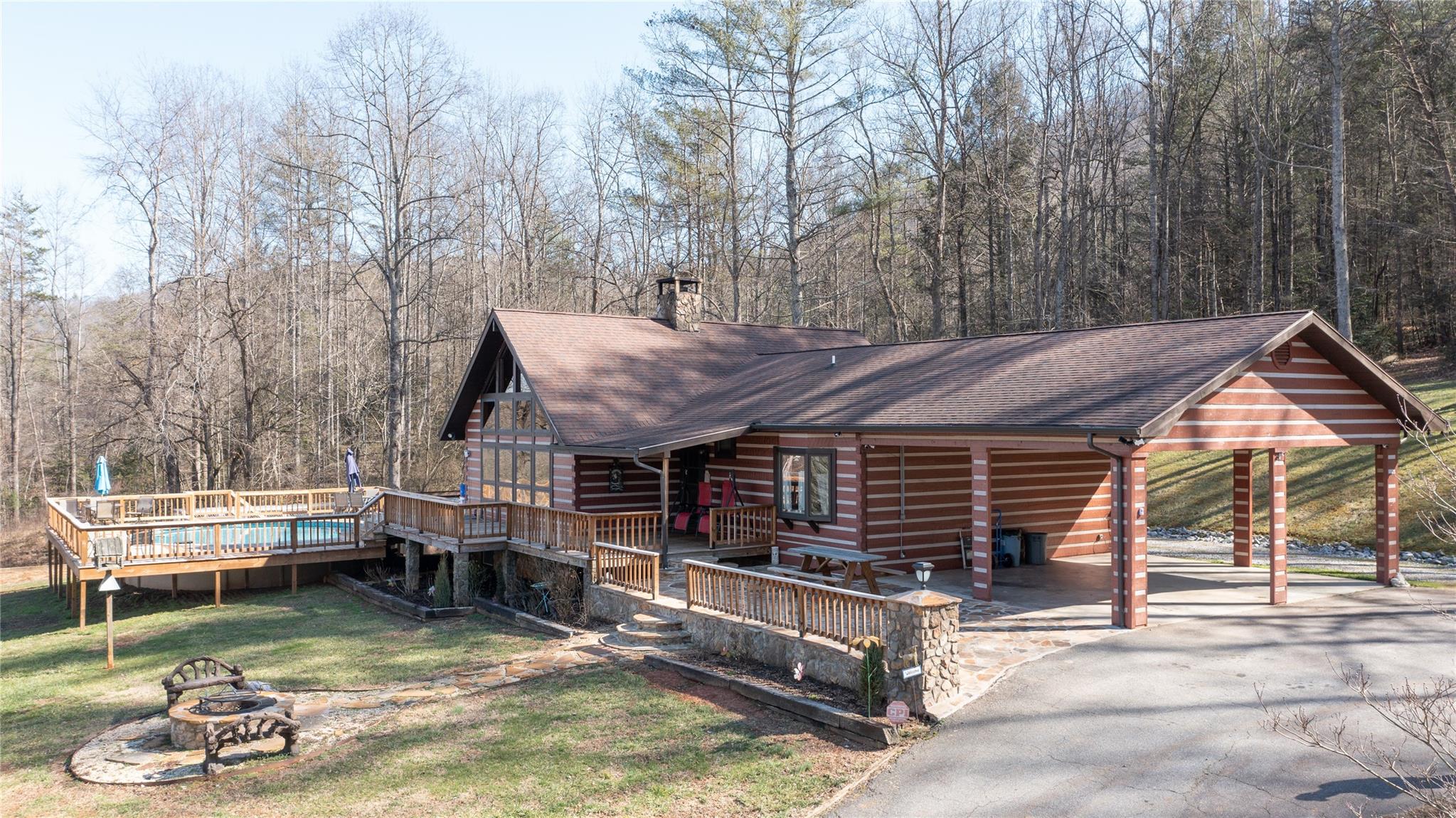 2525 Winkler Way Road Lenoir, NC 28645 - Photo 2 of 47 a view of a house with backyard porch and sitting area