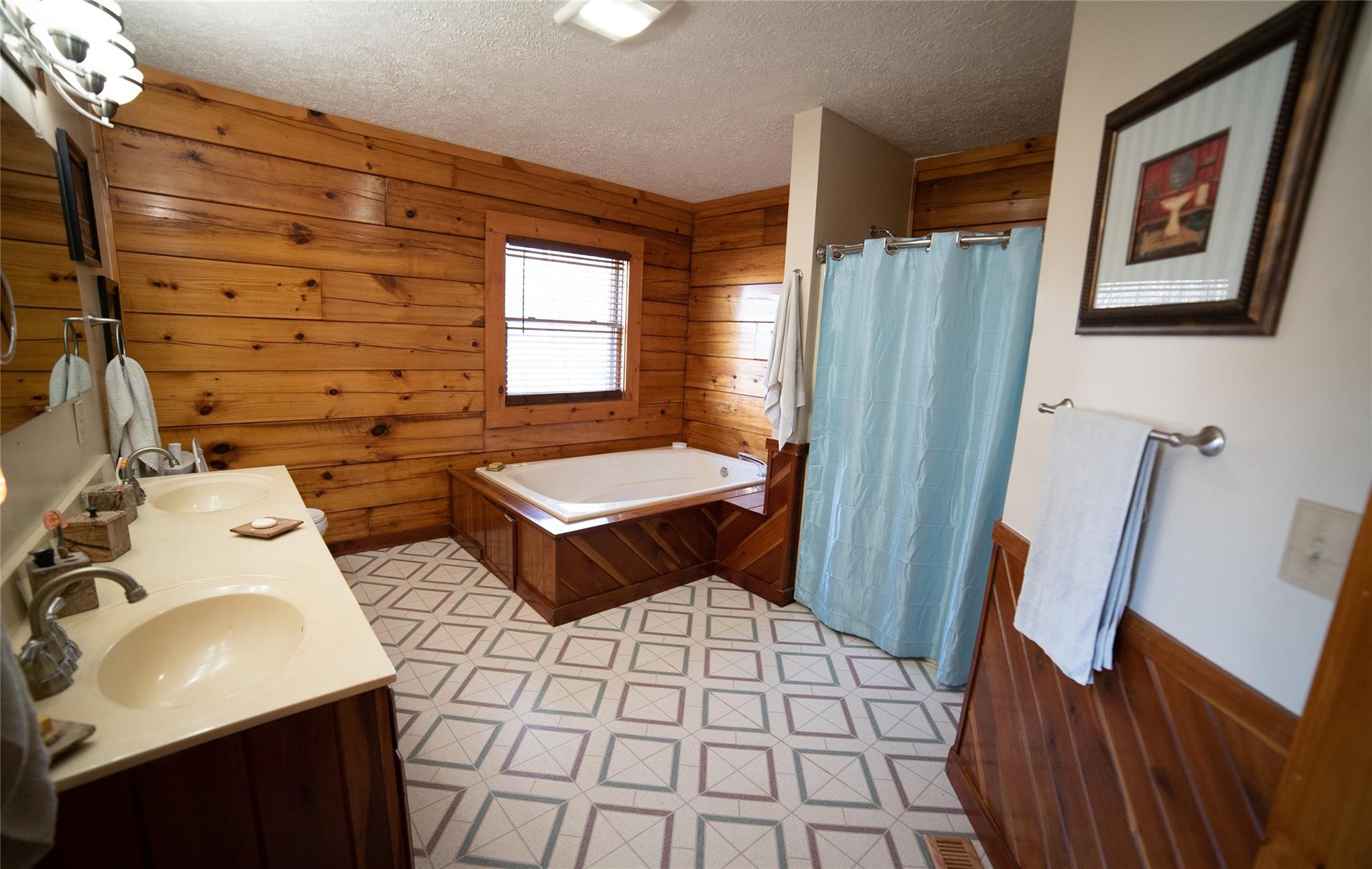 2525 Winkler Way Road Lenoir, NC 28645 - Photo 25 of 47 a bathroom with a sink toilet and shower
