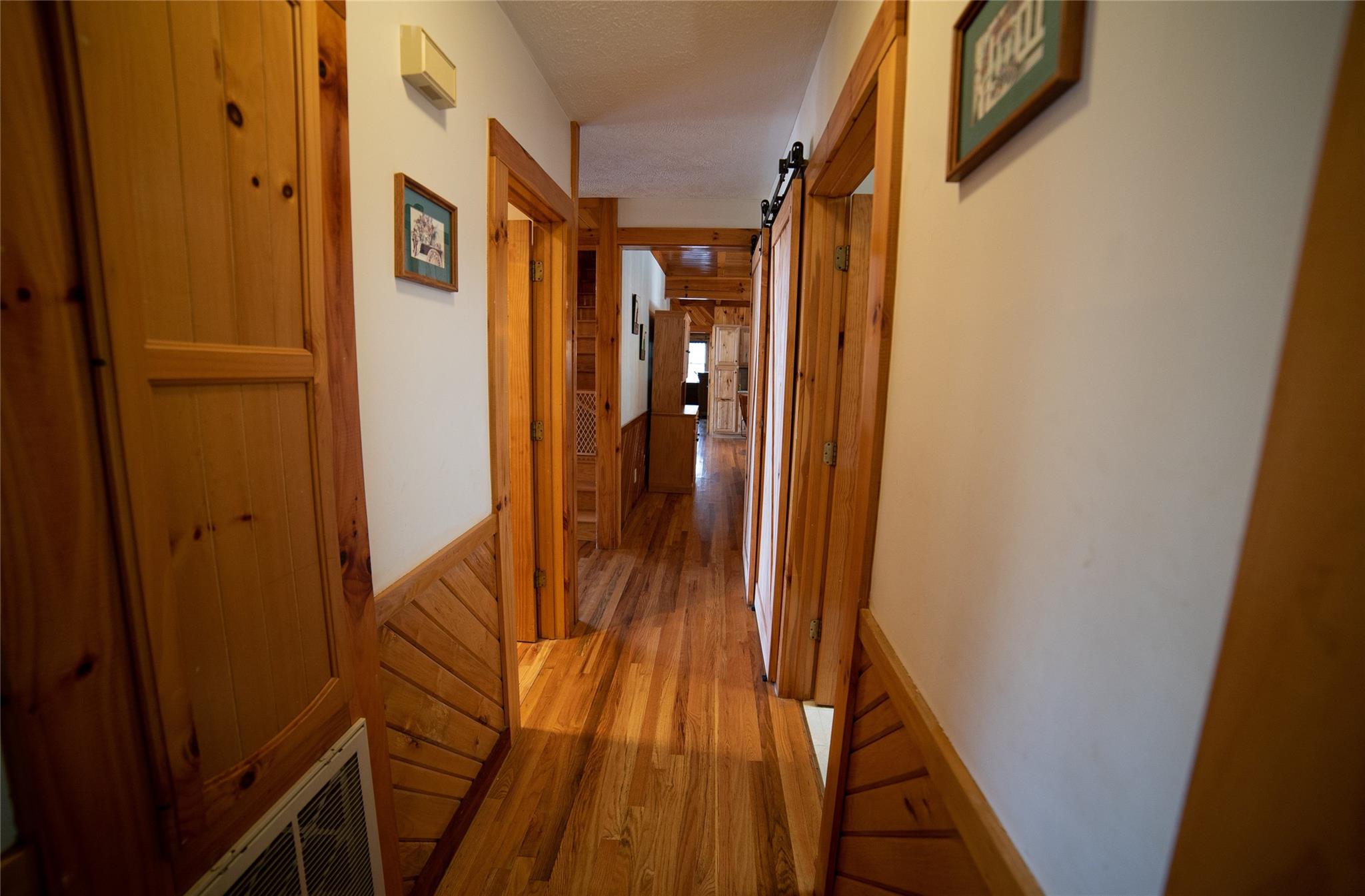 2525 Winkler Way Road Lenoir, NC 28645 - Photo 27 of 47 a view of a hallway with wooden floor and staircase