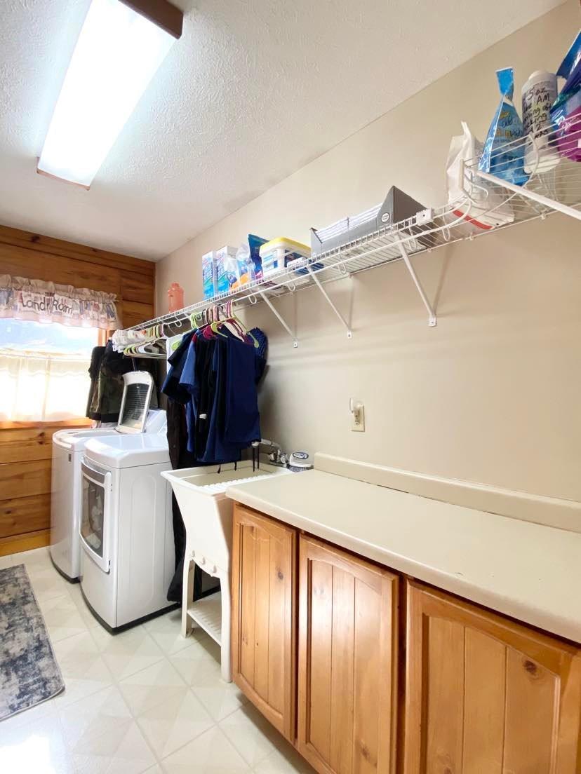 2525 Winkler Way Road Lenoir, NC 28645 - Photo 28 of 47 a utility room with dryer and washer