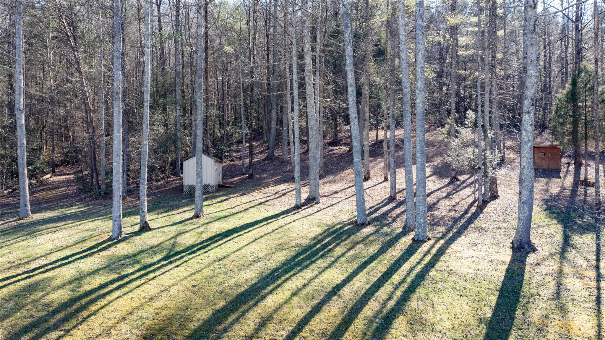 2525 Winkler Way Road Lenoir, NC 28645 - Photo 46 of 47 a view of a balcony with a floor to ceiling window and wooden floor