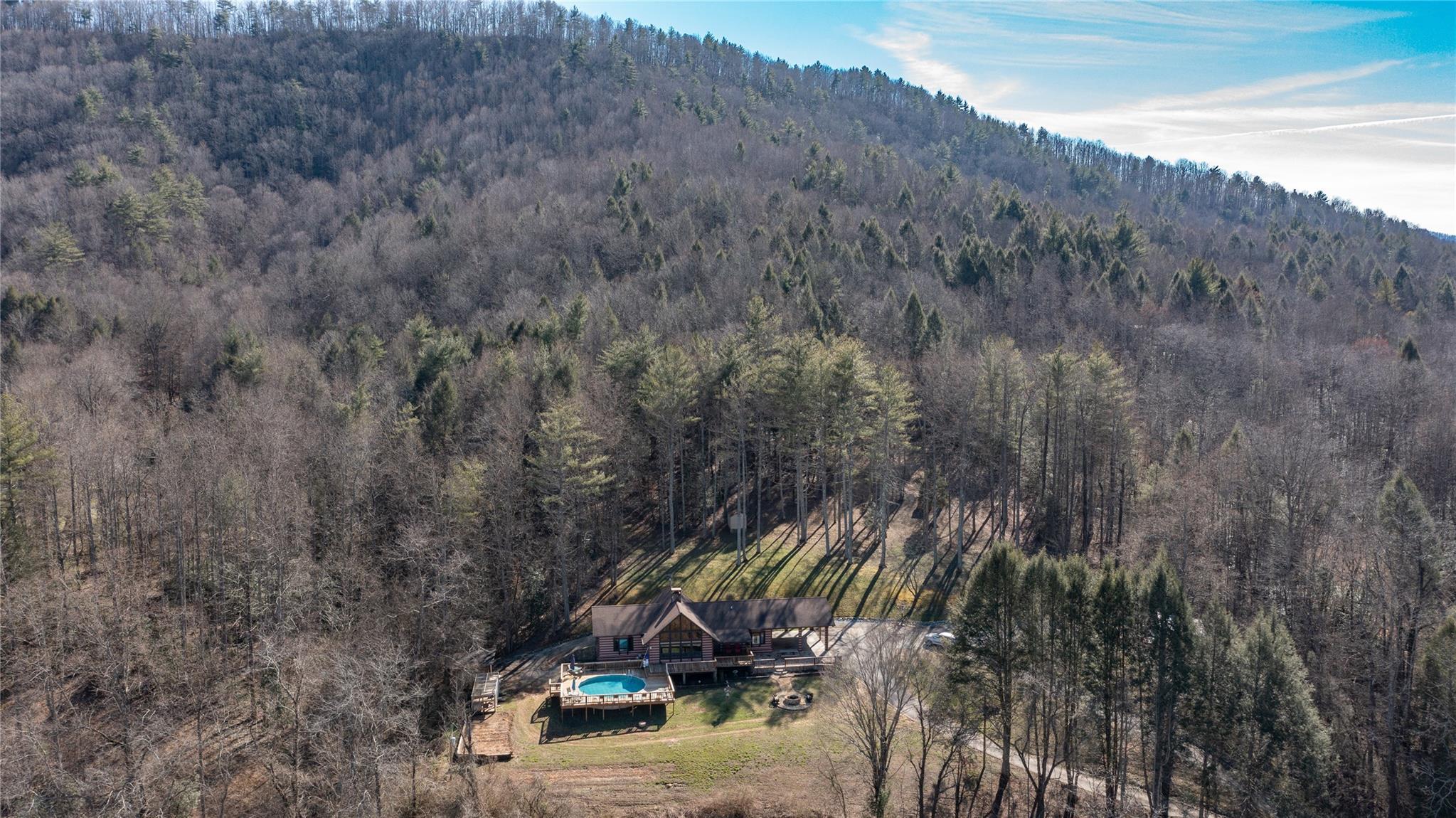 2525 Winkler Way Road Lenoir, NC 28645 - Photo 5 of 47 a view of a yard with a tree