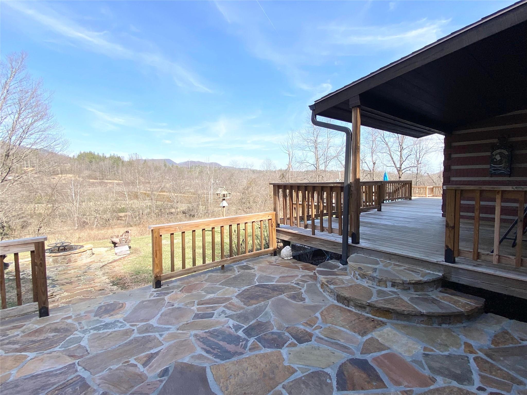2525 Winkler Way Road Lenoir, NC 28645 - Photo 9 of 47 a view of a roof deck with wooden floor and fence
