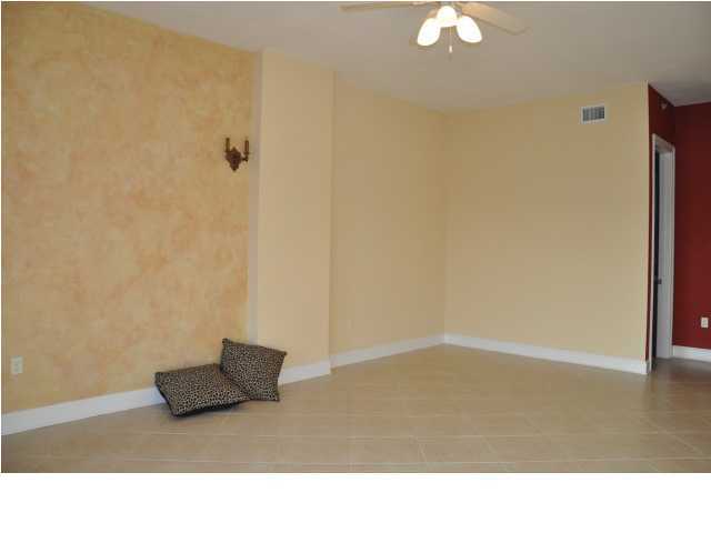 5 Calhoun Avenue, Unit 407 Destin, FL 32541 - Photo 11 of 27 a living room with a couch