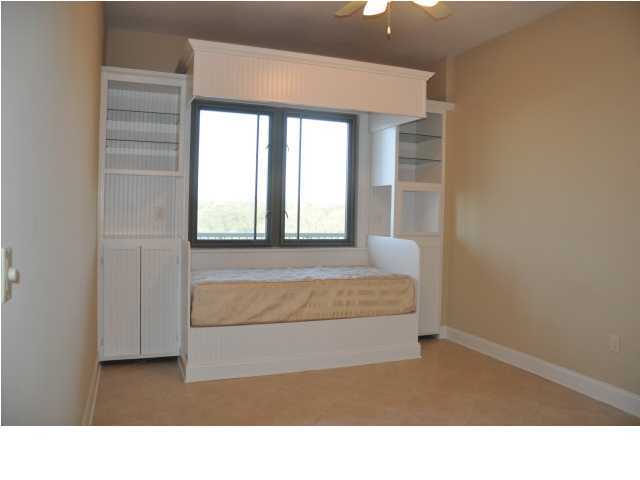 5 Calhoun Avenue, Unit 407 Destin, FL 32541 - Photo 19 of 27 a room with a bed and a window
