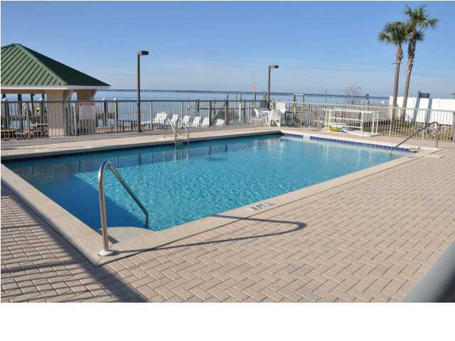 5 Calhoun Avenue, Unit 407 Destin, FL 32541 - Photo 23 of 27 a open kitchen with view of living room