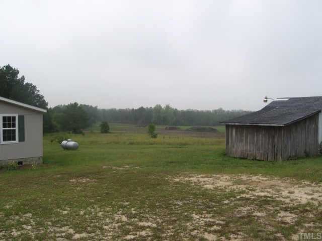 757 Bailey Road Coats, NC 27521 - Photo 7 of 10 a view of a backyard