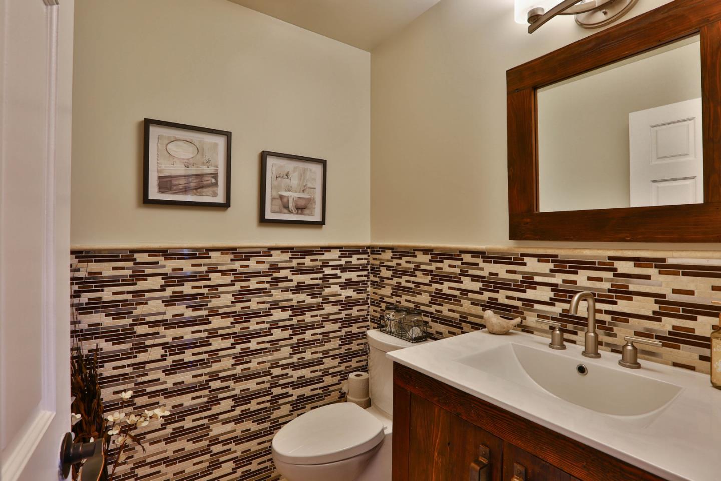 2000 Day Road Gilroy, CA 95020 - Photo 16 of 51 a bathroom with a sink toilet and mirror