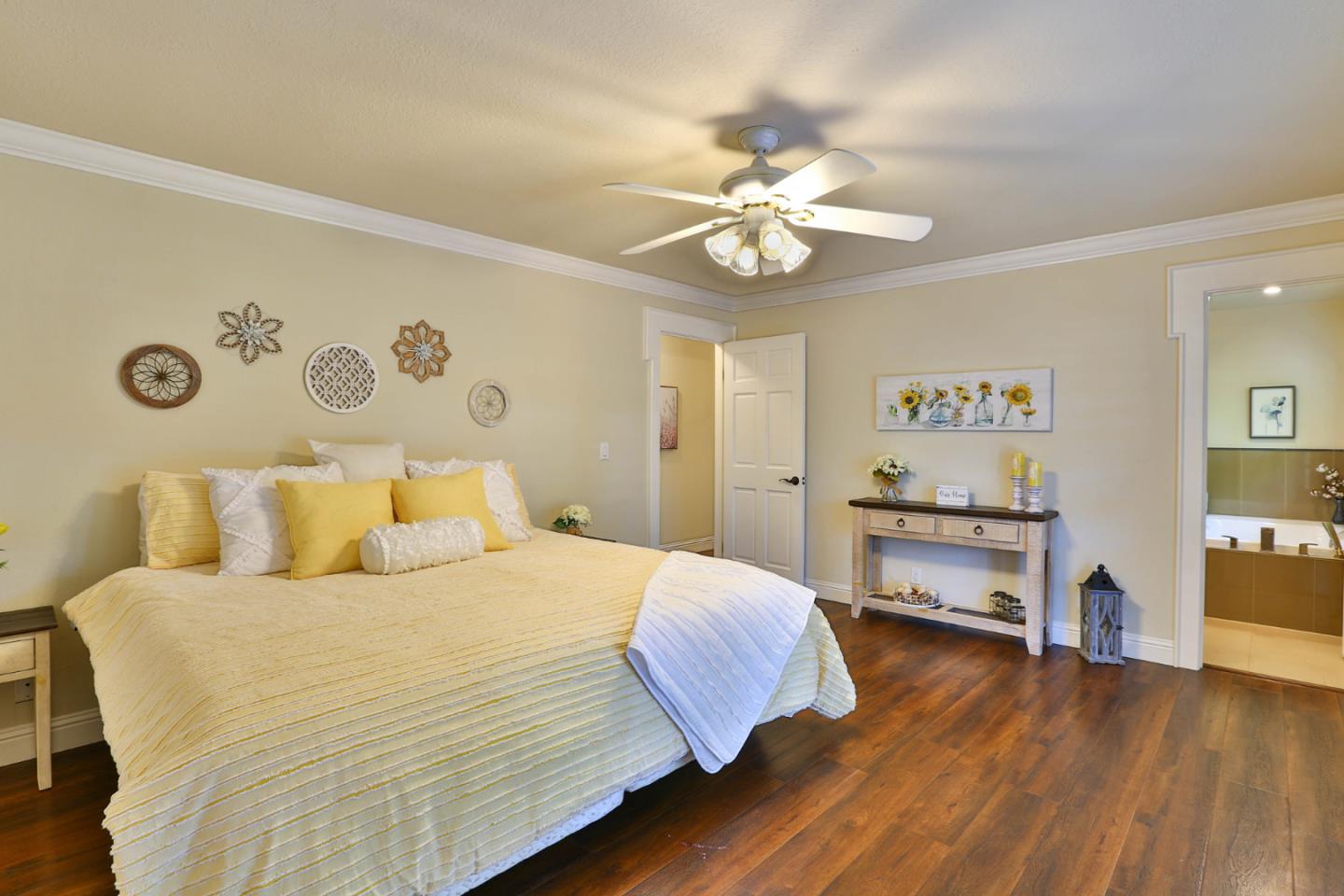 2000 Day Road Gilroy, CA 95020 - Photo 17 of 51 a bedroom with a bed and a chandelier