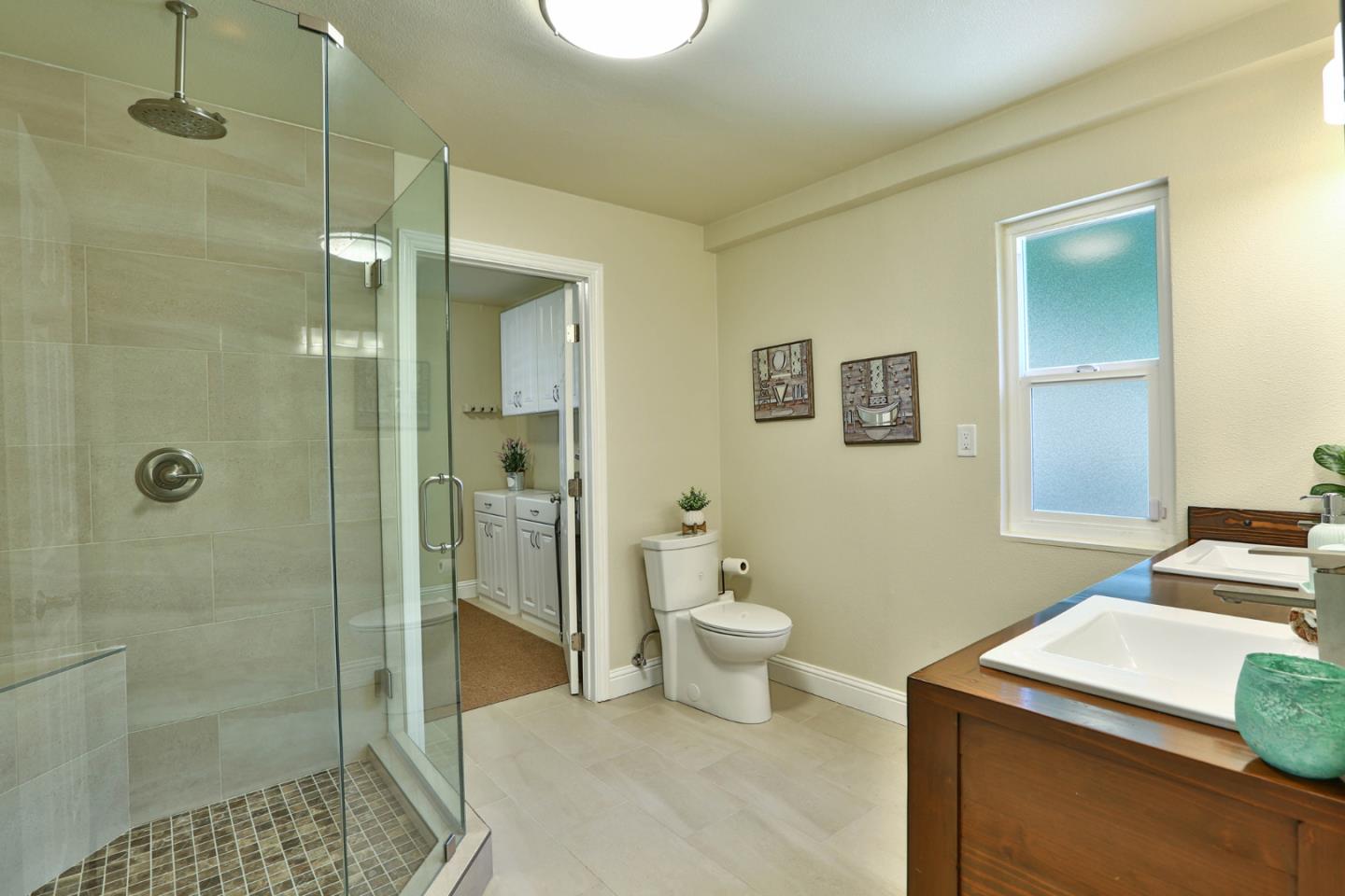 2000 Day Road Gilroy, CA 95020 - Photo 22 of 51 a bathroom with a sink a toilet and shower