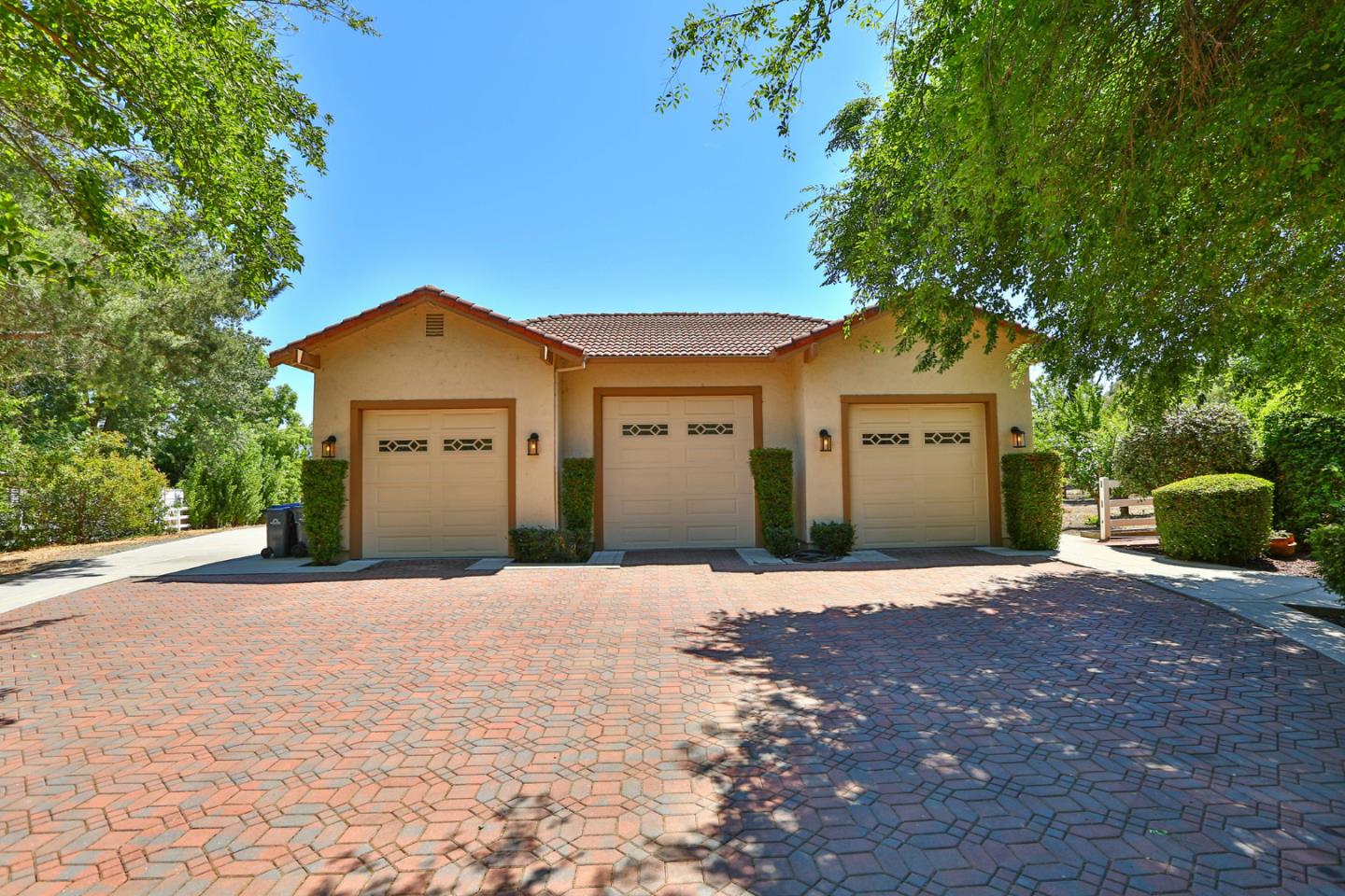 2000 Day Road Gilroy, CA 95020 - Photo 26 of 51 a front view of a house with a yard and garage