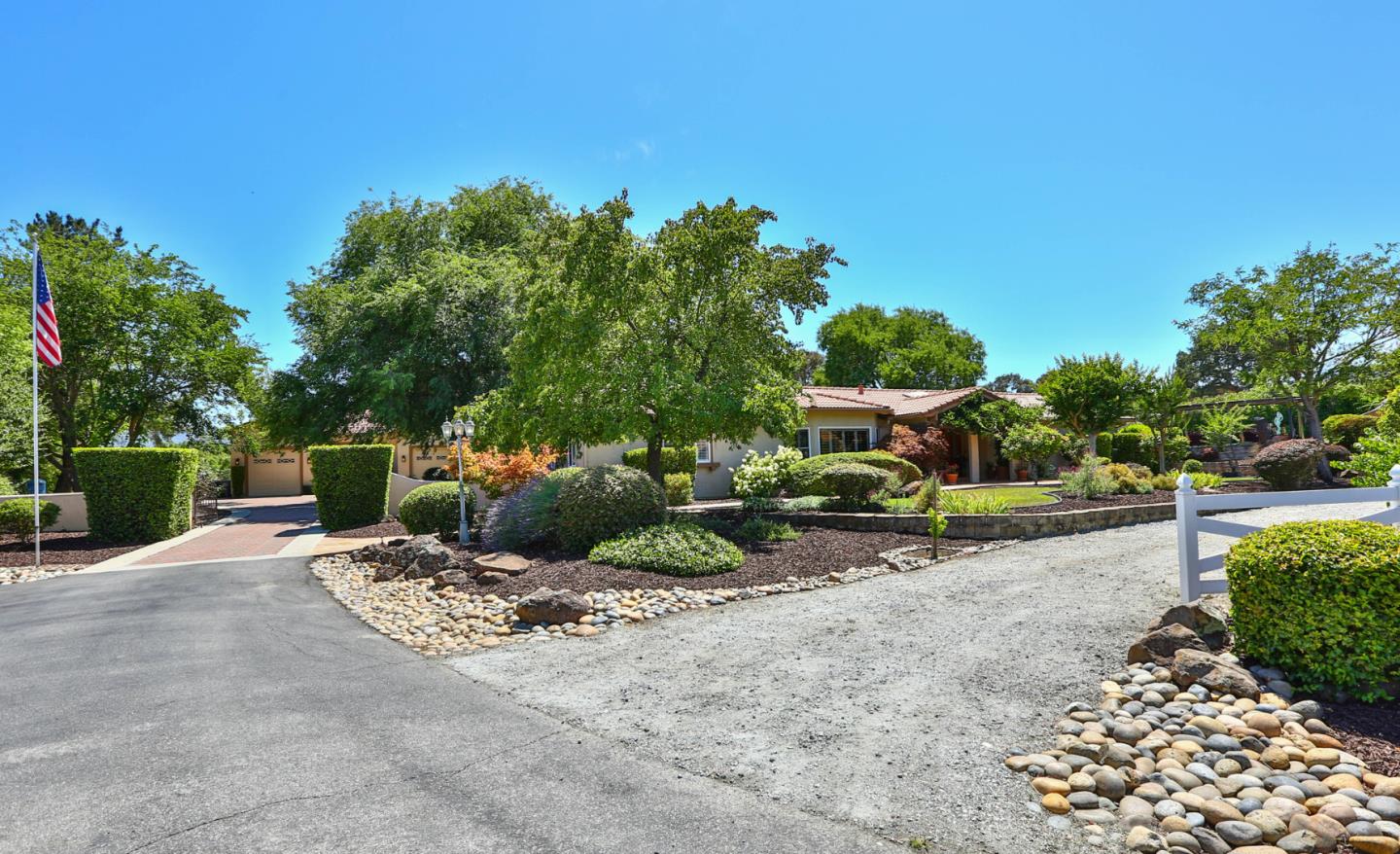 2000 Day Road Gilroy, CA 95020 - Photo 3 of 51 a view of a backyard with plants and a patio