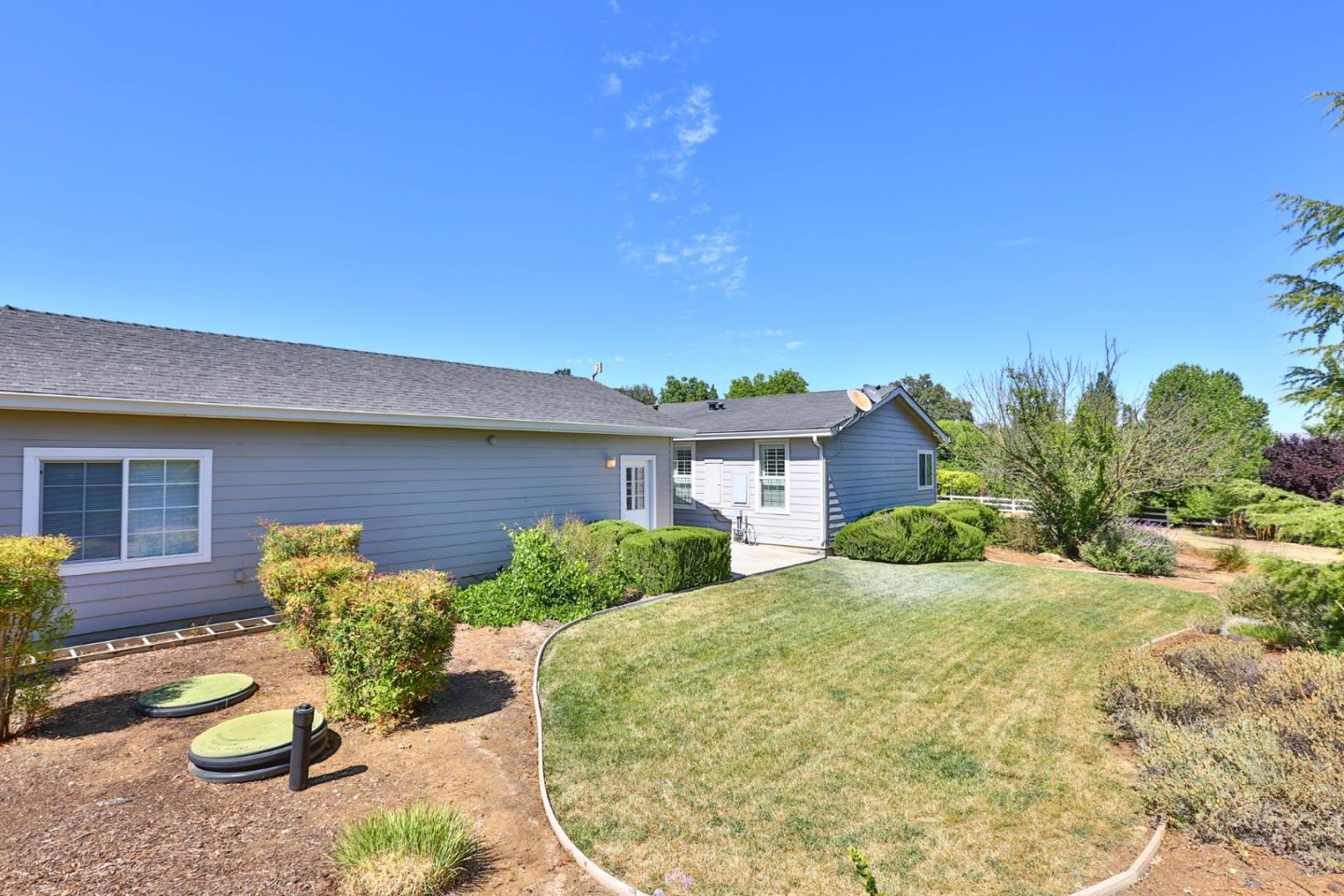 2000 Day Road Gilroy, CA 95020 - Photo 46 of 51 a view of a house with backyard and a garden