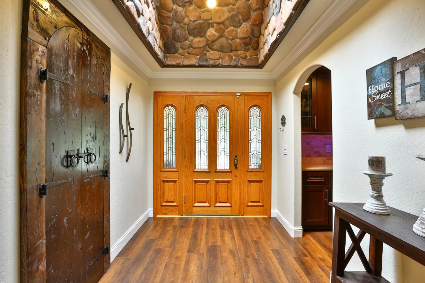 2000 Day Road Gilroy, CA 95020 - Photo 6 of 51 a view of front door with hallway and wooden floor
