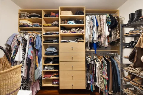 a bathroom with a double vanity sink mirror and