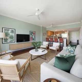 a living room with furniture and a flat screen tv