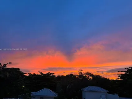 a view of a city with sunset view