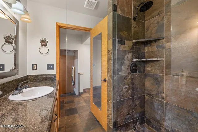 a bedroom with a bed and dresser