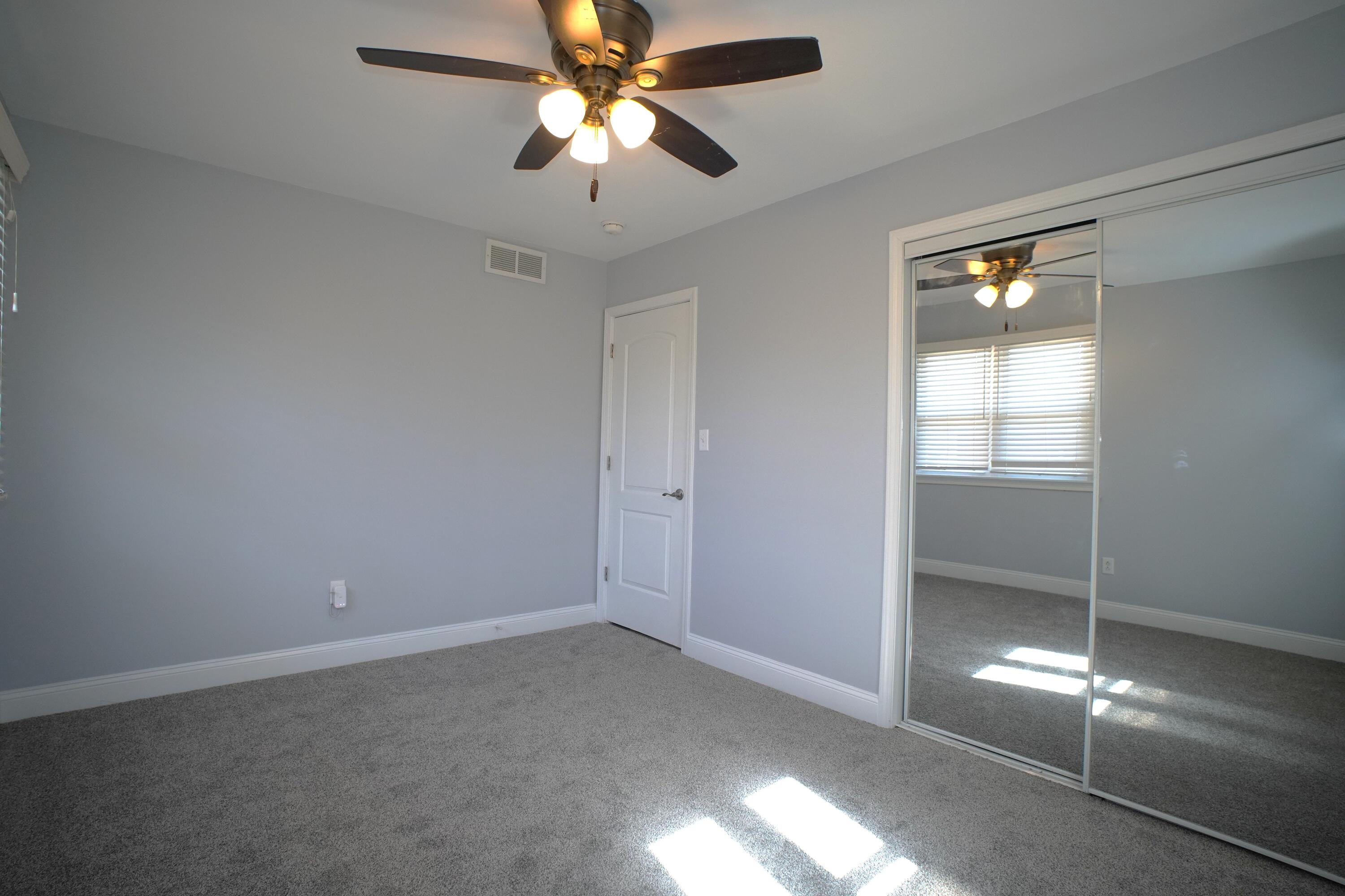1312 Bigger Street Gary, IN 46404 - Photo 21 of 33 wooden floor in an empty room with a window