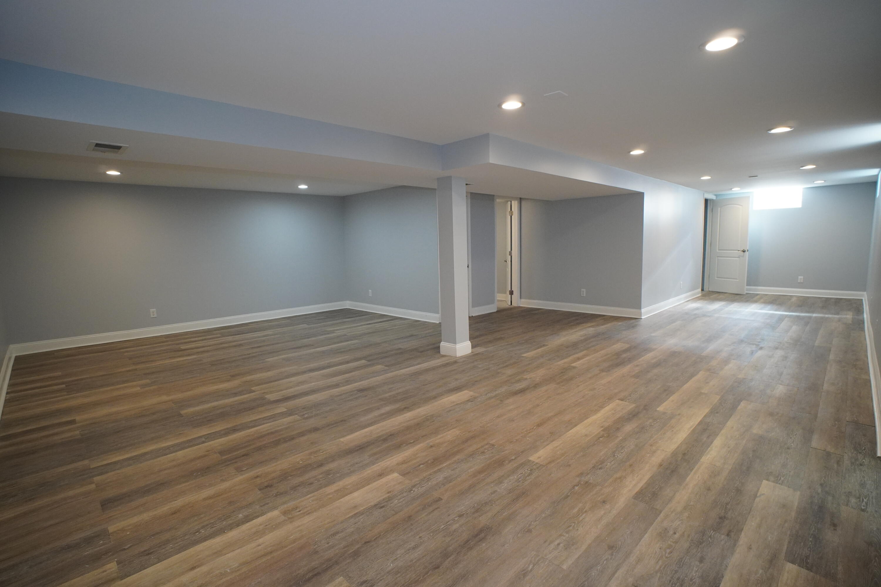 1312 Bigger Street Gary, IN 46404 - Photo 28 of 33 an empty room with wooden floor and windows