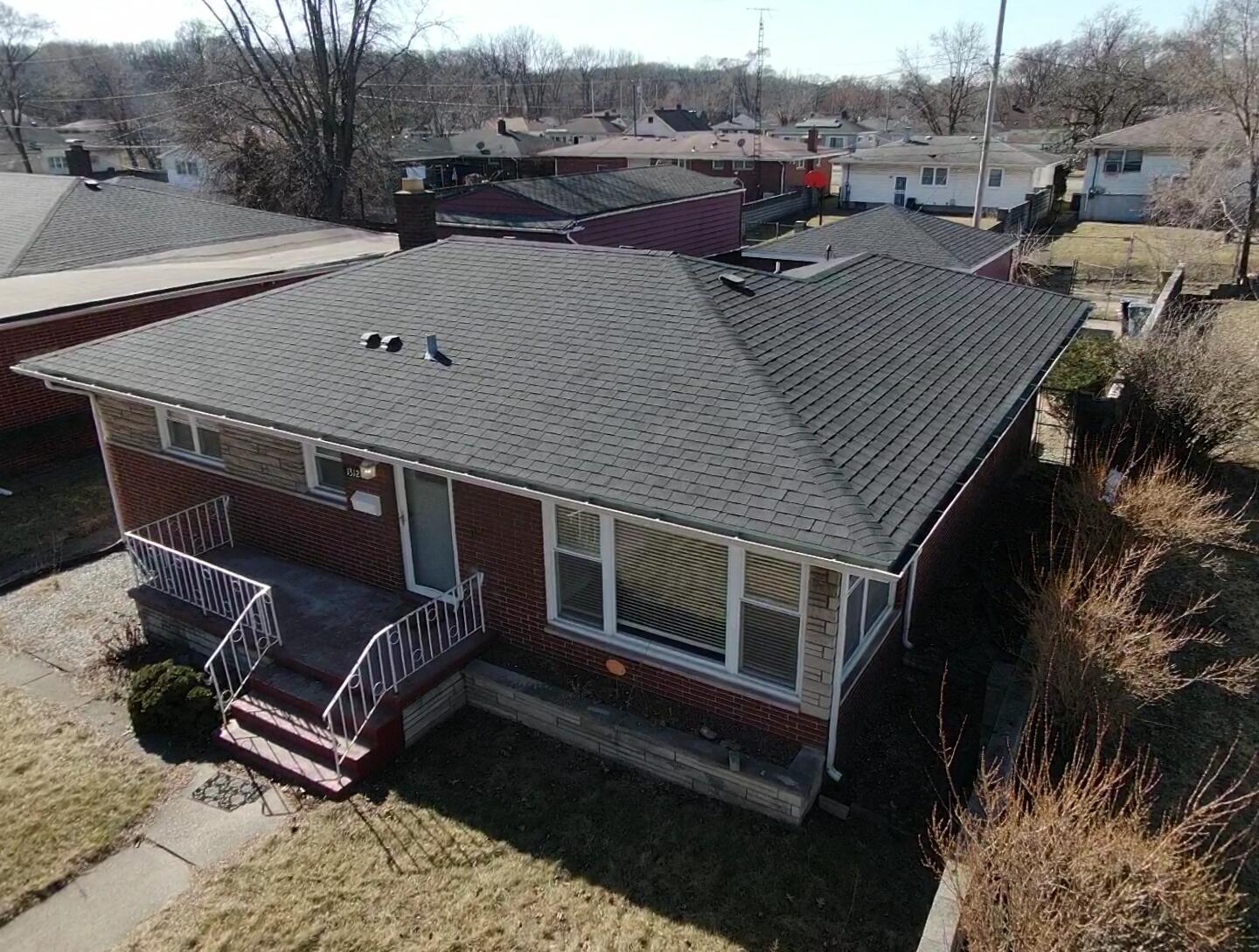 1312 Bigger Street Gary, IN 46404 - Photo 5 of 33 a terrace of a house with outdoor seating