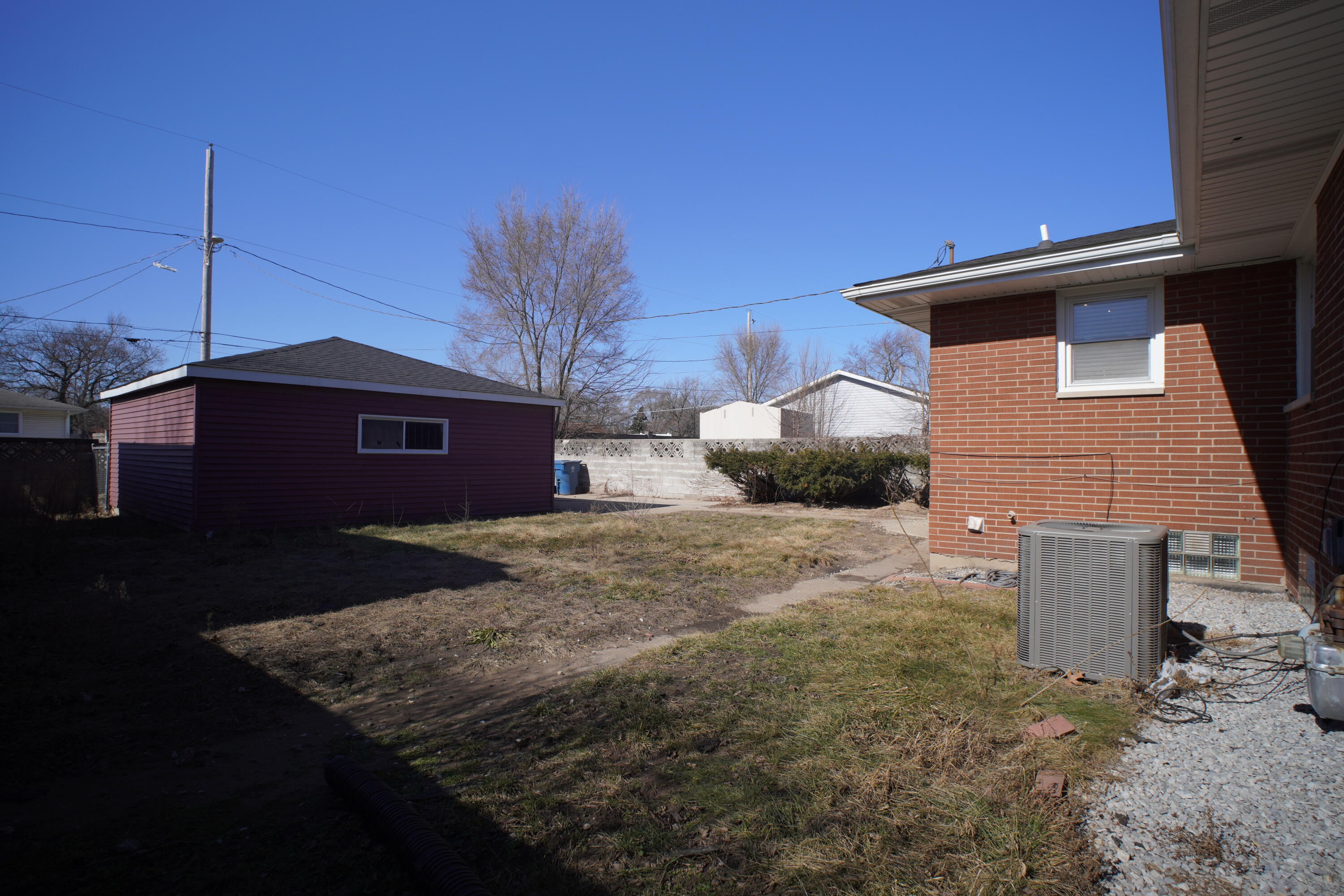 1312 Bigger Street Gary, IN 46404 - Photo 9 of 33 a front view of a house with a yard