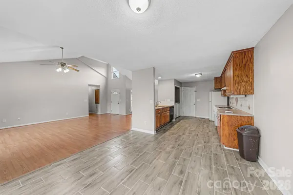 a spacious bathroom with a sink and a mirror