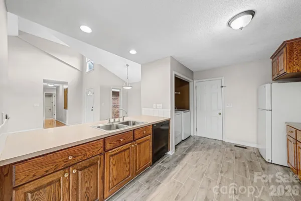 a bathroom with a sink double vanity and a mirror