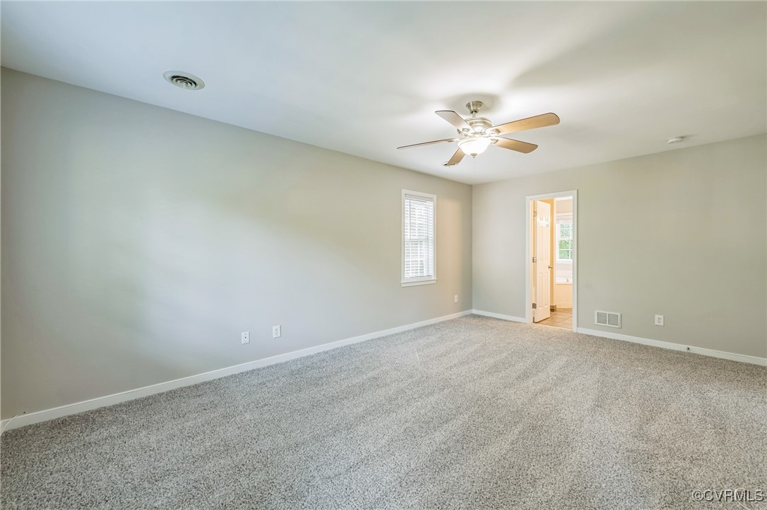 12004 Taplow Road Midlothian, VA 23112 - Photo 20 of 32 a view of an empty room with a window