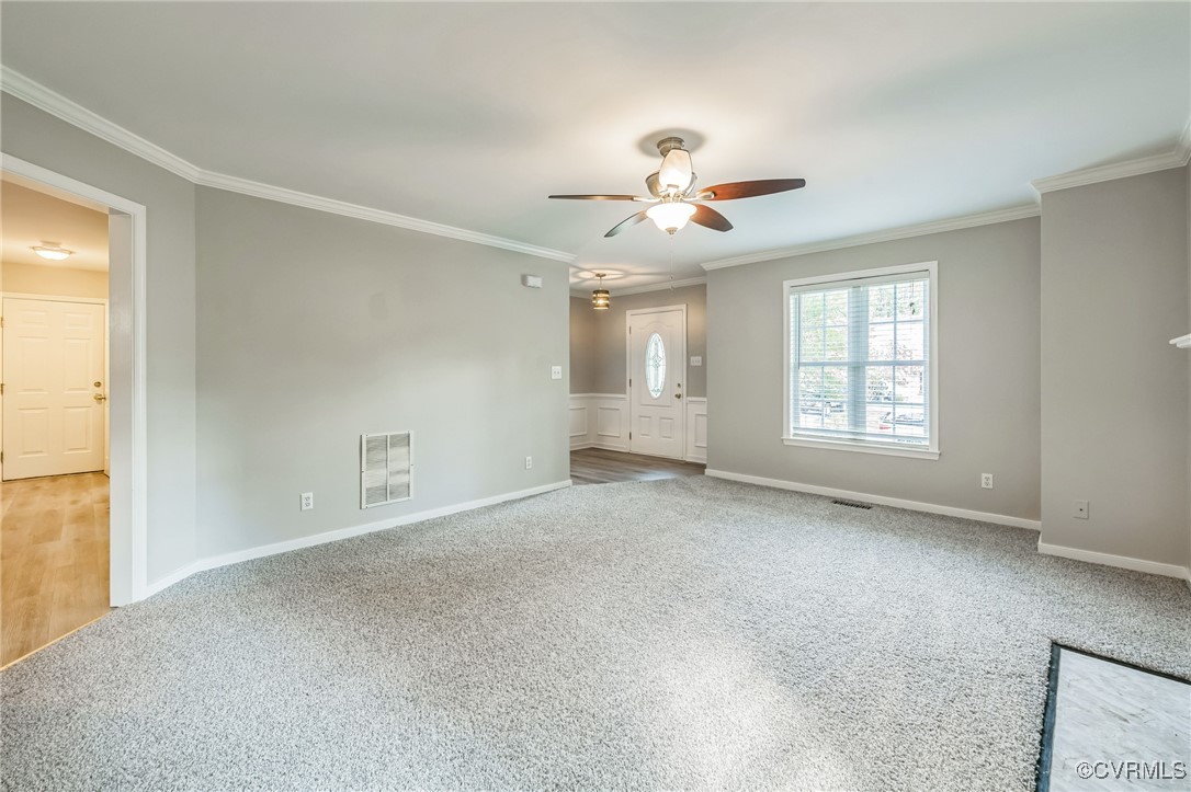 12004 Taplow Road Midlothian, VA 23112 - Photo 3 of 32 a view of an empty room with a window
