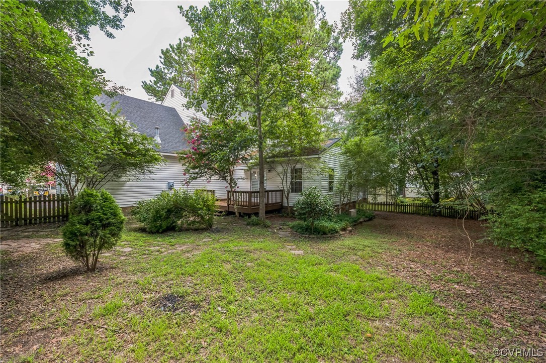 12004 Taplow Road Midlothian, VA 23112 - Photo 31 of 32 a view of a backyard with a garden and entertaining space